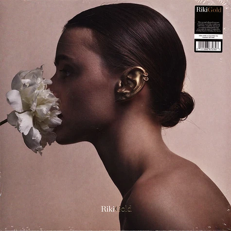 Riki - Gold Cloudy White Vinyl Edition