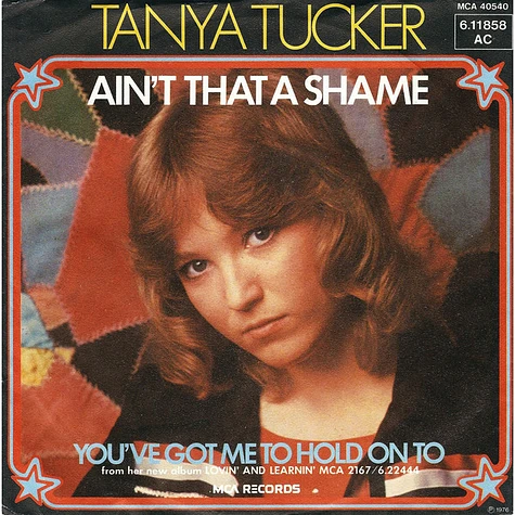 Tanya Tucker - Ain't That A Shame