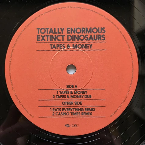 Totally Enormous Extinct Dinosaurs - Tapes & Money