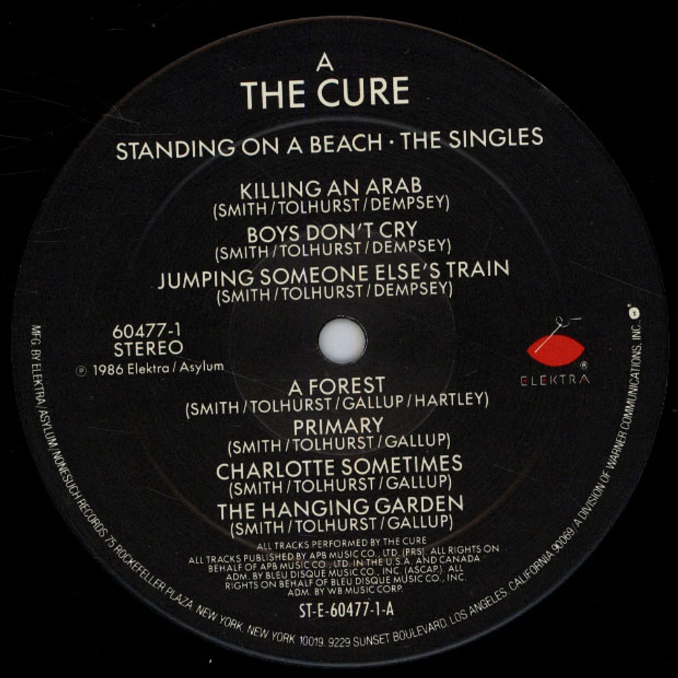 The Cure - Standing On A Beach • The Singles