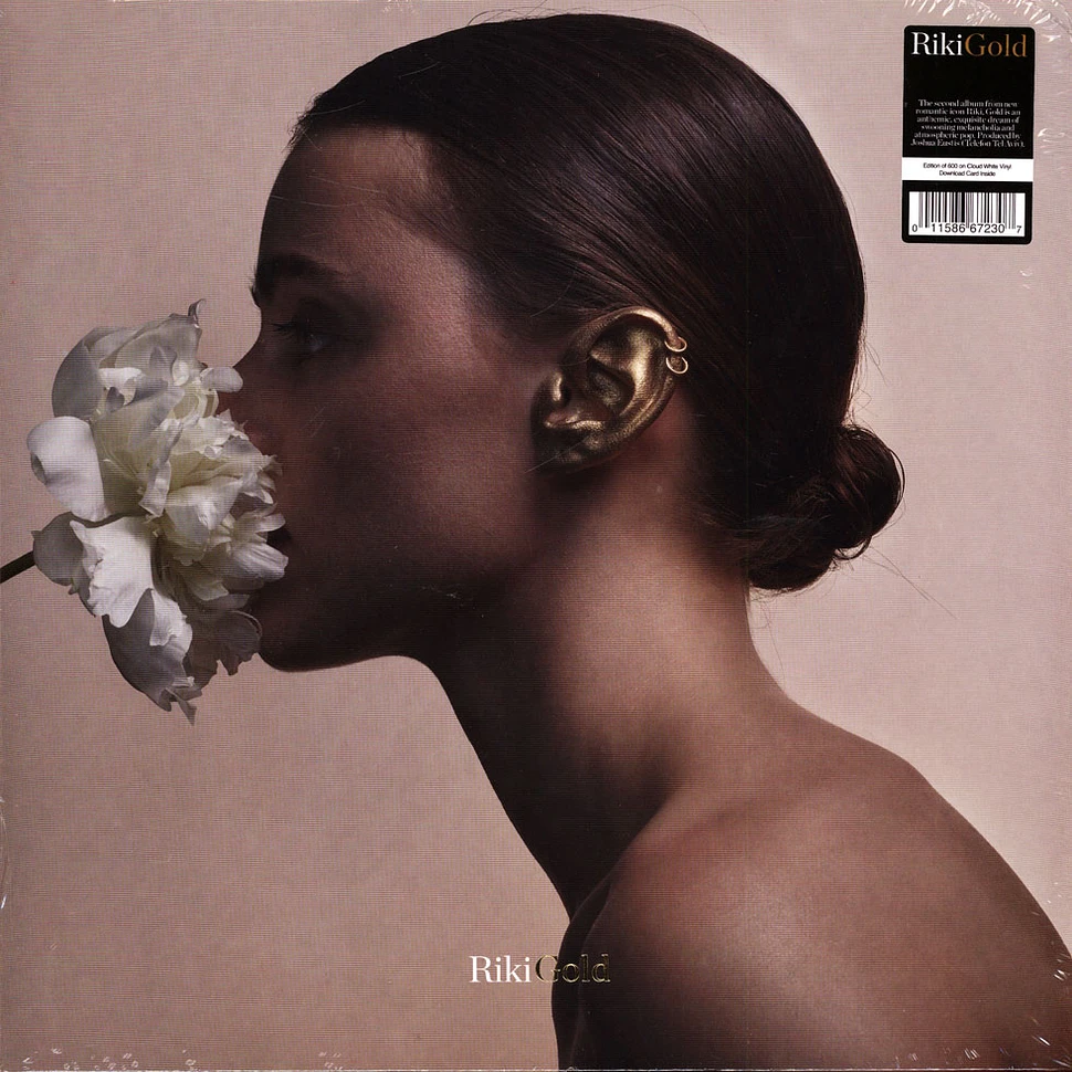 Riki - Gold Cloudy White Vinyl Edition