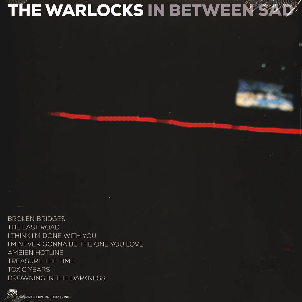 The Warlocks - In Between Sad Silver Red Splatter Vinyl Edition