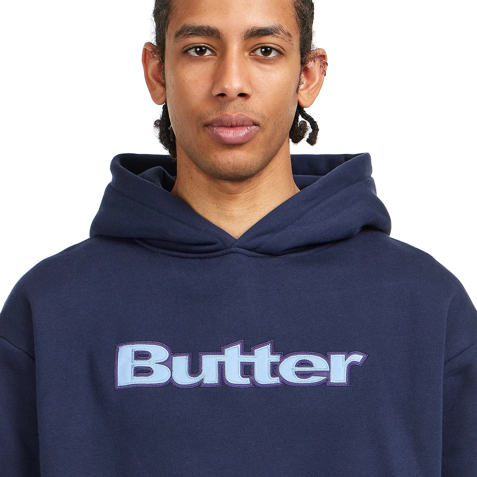 【BUTTER GOODS】Satin Logo Applique Pullover Hood パーカー Satin Logo Applique Pullover Hood, Black – Butter Goods